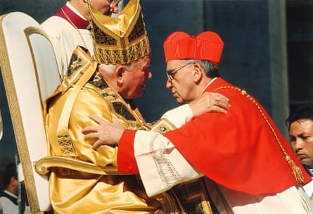 Pope John Paul II embracing Jorge Mario Bergoglio on his elevation to be a cardinal in 2001.