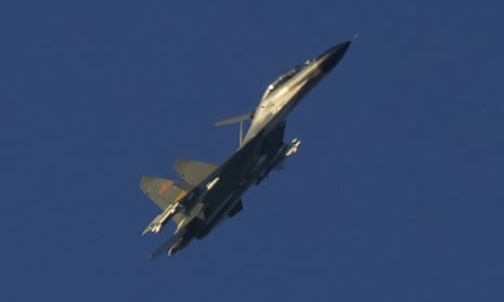 A Chinese fighter jet flies above the Taiwan strait near Pingtan on Friday.