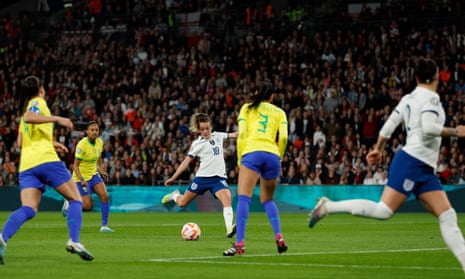 England's Ella Toone opens the scoring .