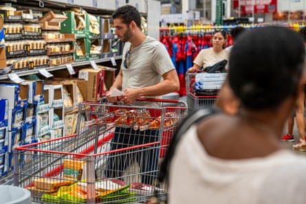 People shop at a Costco