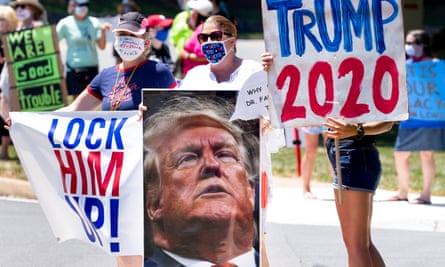 Protesters outside the Trump National Golf Club in Sterling, Virginia on Saturday.