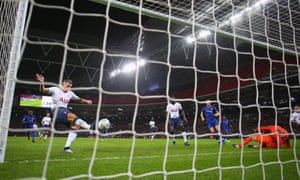 Toby Alderweireld of Tottenham Hotspur clears the ball off the line after a save from Paulo Gazzaniga.
