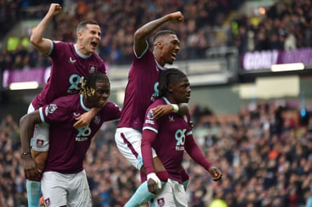 Loum Tchaouna is joined by delighted teammates Jaidon Anthony, Josh Cullen and Lesley Ugochukwu having scored their second goal against Leeds.