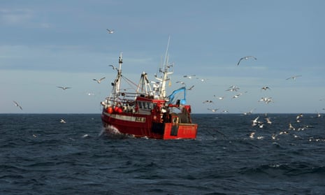 A trawler casts its nets into the North Sea