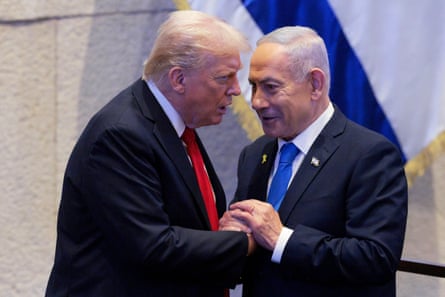 Donald Trump talks to Benjamin Netanyahu at the Knesset, Israel.