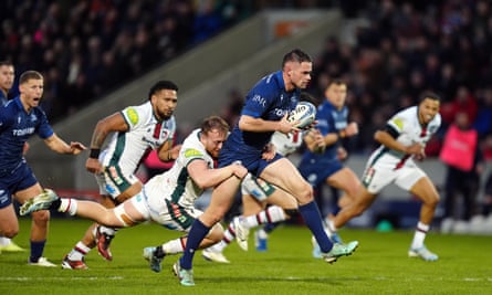 Sale’s Luke James is tackled by Leicester’s Tommy Reffell during the Premiership match at the Salford Community Stadium.