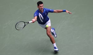 Novak Djokovic stretches for a forehand.