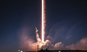 A Falcon 9 rocket is launched with two SpaceX test satellites for global broadband at Vandenberg Air Force base.