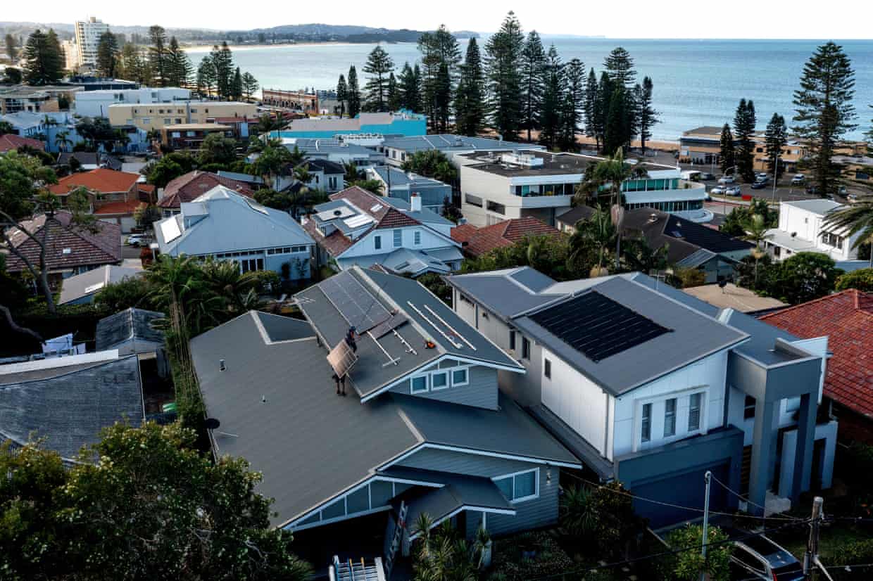 Installation of solar panels on the roofs of homes in Sydney