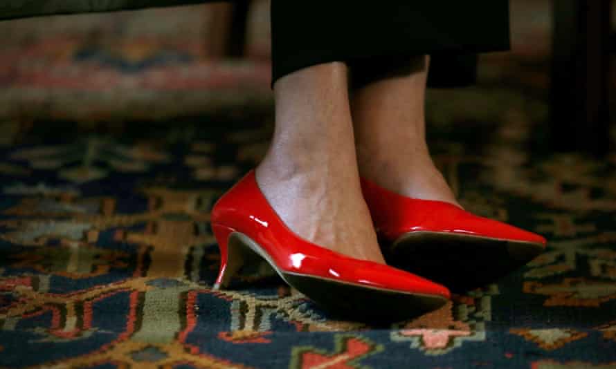 May’s red patent pumps as she met with Scotland’s First Minister Nicola Sturgeon on July 15.