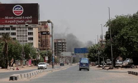 Smoke is seen rising from a neighbourhood in Khartoum.