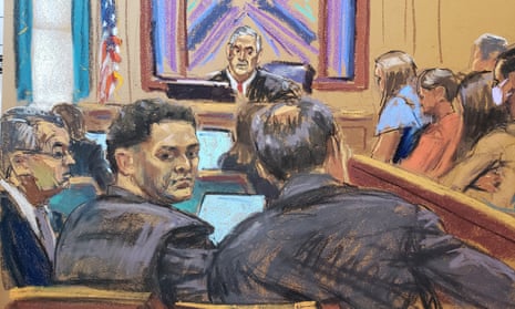 Sam Bankman-Fried sits beside his defense lawyer, as seen in a courtroom sketch, in New York City on 3 October. 