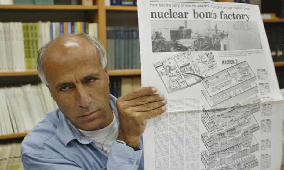 Vanunu holds a copy of the original newspaper in which he revealed Israel’s nuclear secrets, in Jerusalem, 2004.