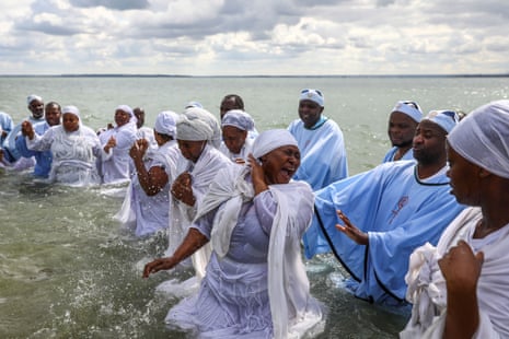 A mass baptism on the beachfront in Southend-on-Sea