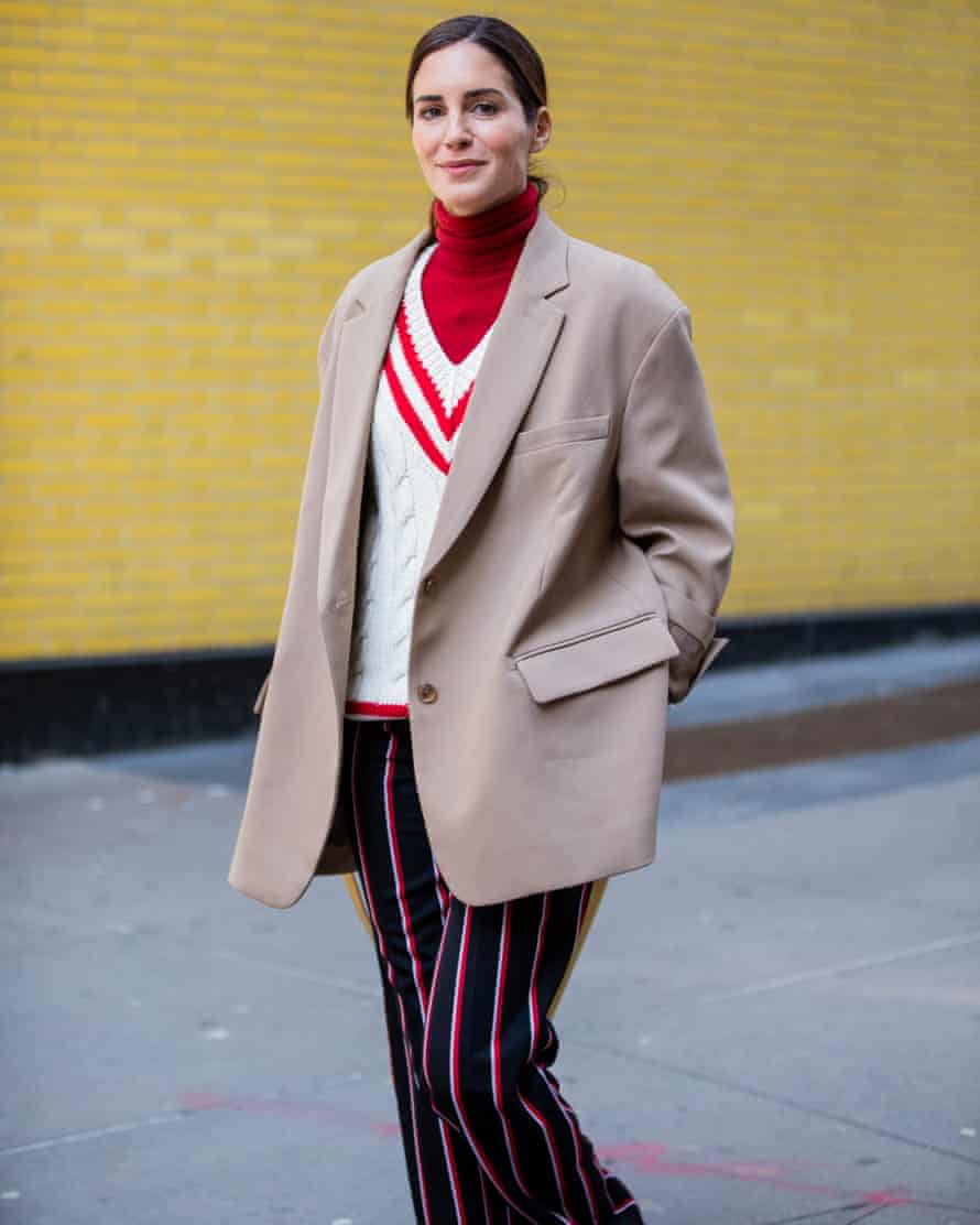 Model Gala Gonzalez at New York Fashion Week in 2020 - wearing a Quant-style cricket sweater borrowed from '60s men's wardrobes.