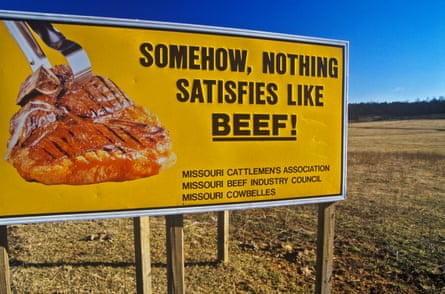 sign says ‘somehow, nothing satisfies like beef!’ with ‘missori cattlemen’s association’, ‘missouri beef industry council’ and ‘missouri cowbelles’ written under it