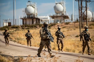 US soldiers on patrol near an oil production facility near al-Malikiyah, Syria on October 27, 2020.
