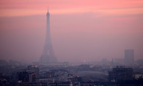 The Eiffel Tower clouded by high levels of air pollution in Paris, France
