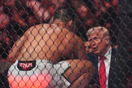 Paulo Costa talks with President Donald Trump after he won his fight at UFC 327 at the Kaseya Center in Miami