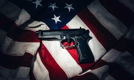 Gun Laying on an American Flag in Gun Control, Conceptual image