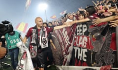 Andrés Iniesta greets spectators after his final game for Vissel Kobe.