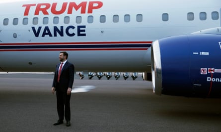 a man in front of a plane
