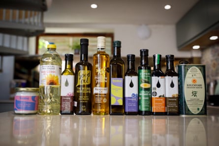 11 different cooking oils lined up on the counter in Rachel’s kitchen