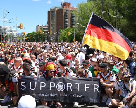 Germany fans march towards the stadium.