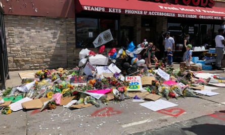 People continue to leave remembrances at the site of George Floyd’s arrest.