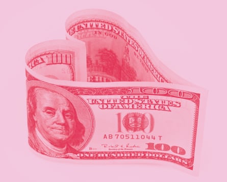 $100 bills in the shape of a heart
