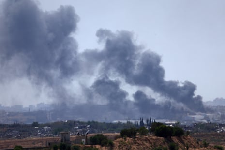 Smoke rises in northern Gaza, as seen from Israel on Friday.