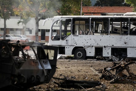 Destroyed vehicles at La Carlota military airbase in Caracas.