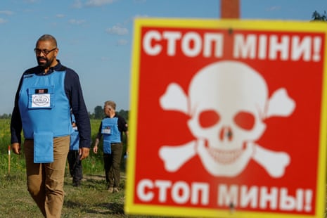 James Cleverly in the village of Hrebelky, in Kyiv region, Ukraine, earlier today, with members of the Halo Trust, a charity engaged in clearing landmines.