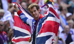 Britain’s Andy Murray poses with his gold medal at the London Olympics.