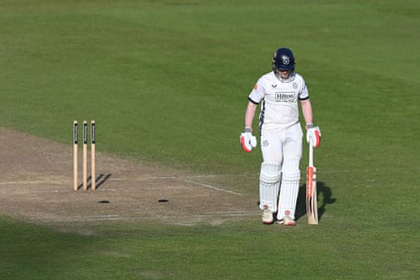 Ben Brown of Hampshire walks off after he was bowled by Simon Harmer.