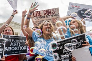 Anti-abortion activists celebrate in front of the supreme court in Washington.