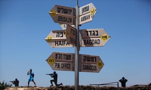 A signpost in different languages in the Golan Heights