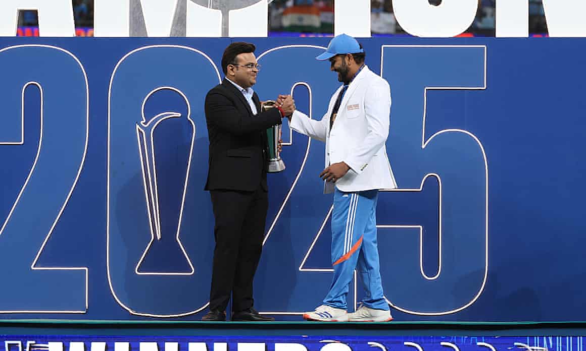 India’s captain Rohit Sharma receives the winners trophy from the ICC chair, Jay Shah