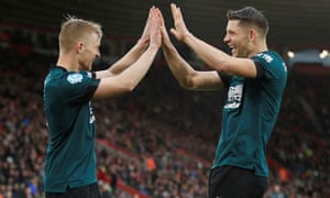 Burnley’s James Tarkowski and Ben Mee celebrate their first goal scored by Ashley Westwood.