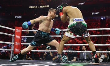Canelo Álvarez throws a shot at Jaime Munguía during Saturday’s fight.