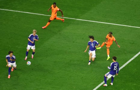 Netherlands' Crysencio Summerville scores their second goal.