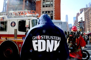The back of a person in a Ghostbusters FDNY hoodie