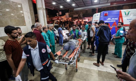 Gazans Await Aid As Israel's Siege ContinuesKHAN YUNIS, GAZA - OCTOBER 24: (EDITOR'S NOTE: Image depicts graphic content/injury detail) Palestinians injured in Israeli air raids arrive at Nasser Medical Hospital on October 24, 2023 in Khan Yunis, in the southern Gaza Strip, Gaza. Two weeks after a deadly Hamas attack in southern Israel that sparked a retaliatory siege of Gaza, in which thousands have died and hundreds of thousands have been displaced, aid trucks have started entering the Palestinian territory via Egypt carrying food, water and medicines. The UN agency UNRWA, or the Relief and Works Agency for Palestine Refugees, says the initial aid is a "drop in the ocean" of what is needed. (Photo by Ahmad Hasaballah/Getty Images)