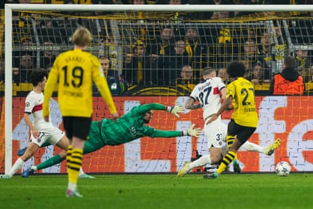 Karim Adeyemi pounces to put Dortmund ahead.