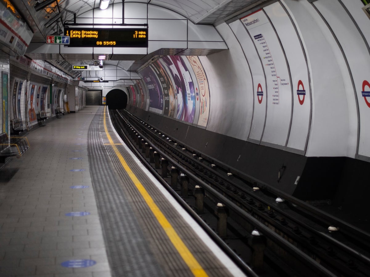woman falls on to live rails at london tube station london the guardian woman falls on to live rails at london tube station london the guardian