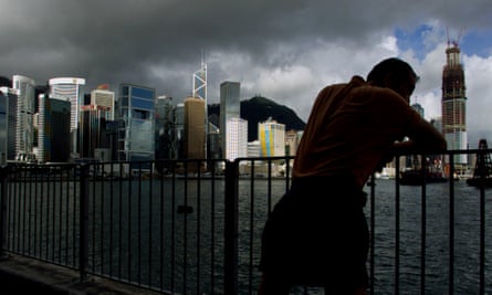 man on waterfront in Hong Kong