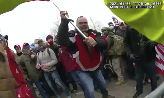 A still from Metropolitan police department body camera video shows Webster assaulting an officer using a metal flagpole.