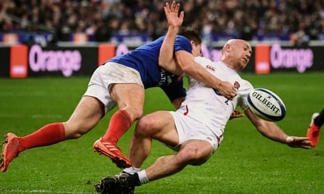 France’s scrum half Antoine Dupont floors Willi Heinz of England during the Six Nations match at Saint Denis on Sunday.