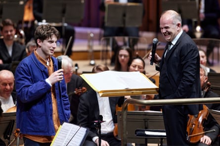 Composer Christian Drew, left, and François-Xavier Roth on stage at the Barbican.