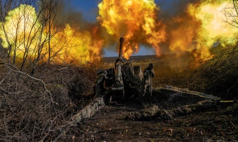 A Ukrainian soldier of a artillery unit fires towards Russian positions outside Bakhmut on November 8.